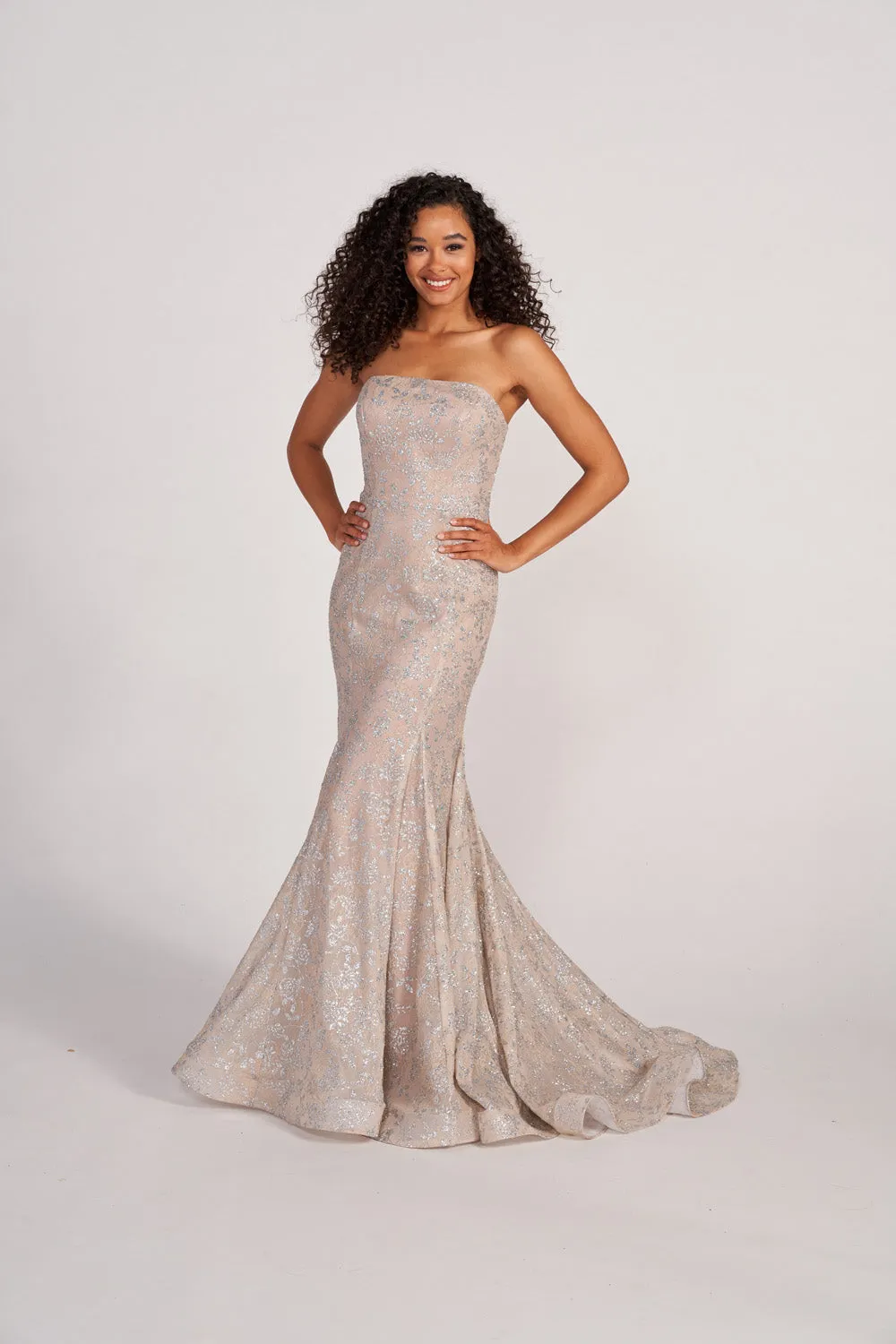 Certainly! To optimize the title of the Colette CL2048 Dresses for an e-commerce platform, we should include modifiers that highlight important features of the product, such as style, occasion, and unique aspects. Heres a revised version:

Colette CL2048 Elegant Evening Gown - Glamorous Formal Dress with Sequins and Lace for Special Occasions

This title now includes modifiers like Elegant, Glamorous, Formal Dress, Sequins, and Lace, which can attract customers looking for specific qualities in a dress.